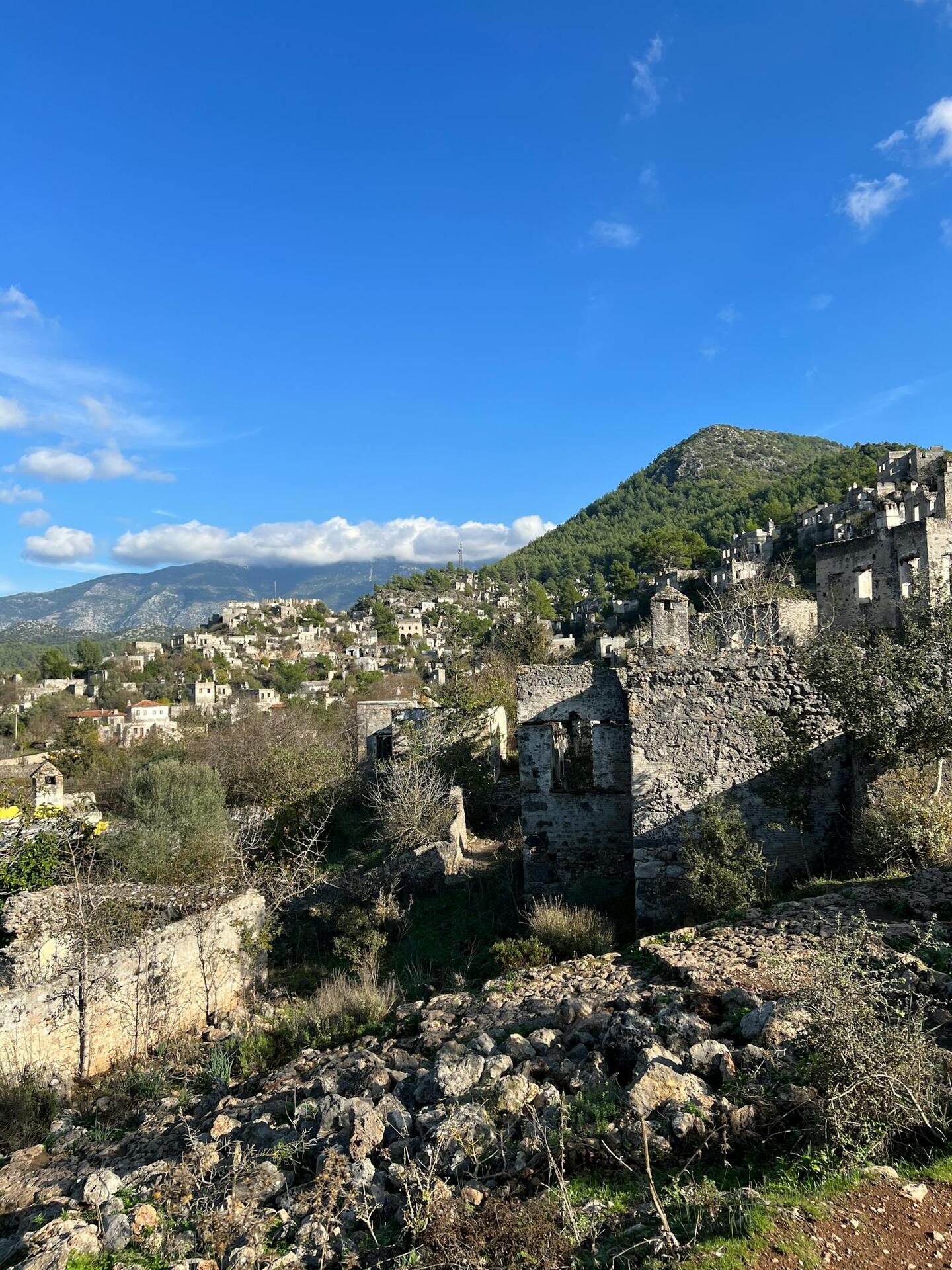 The stone houses of an abandoned hillside village